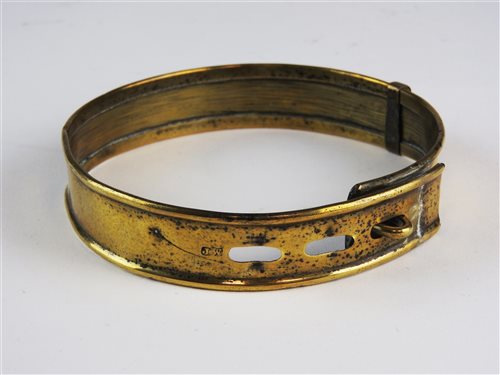 Lot 494 - A small brass dog collar, 19th century