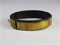 Lot 473 - A brass dog collar
