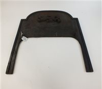 Lot 128 - A cast iron fire back and an oak perdonium