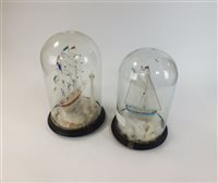 Lot 95 - Two Victorian glass frigates under domes