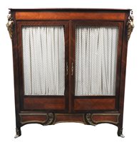 Lot 626 - A French cross banded walnut and ormolu mounted wardrobe