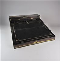Lot 562 - A rosewood and brass mounted campaign lap desk, mid 19th century