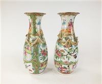 Lot 115 - A pair of Chinese Canton famille rose vases