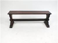 Lot 317 - A small stained oak slatted ecclesiastical bench