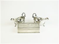 Lot 8 - A pair of silver sauce boats and cigarette box