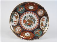 Lot 173 - A Japanese Arita Imari porcelain charger