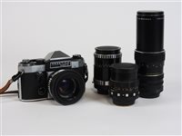 Lot 198 - A hard camera case containing