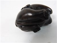 Lot 294 - A Japanese rosewood netsuke of a monkey