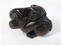 Lot 294 - A Japanese rosewood netsuke of a monkey