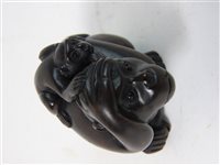 Lot 294 - A Japanese rosewood netsuke of a monkey