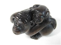 Lot 294 - A Japanese rosewood netsuke of a monkey