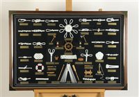 Lot 191 - Framed knots in glass case