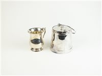 Lot 19 - A silver mug and plated biscuit barrel