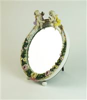 Lot 83 - A Sitzendorf porcelain mirror