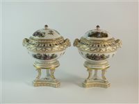 Lot 89 - A pair of German porcelain pot pourri vases and covers