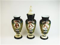 Lot 61 - A garniture of French or Bohemian opaline glass portrait vases
