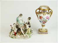 Lot 66 - A late 19th century German porcelain figural group and a twin handled vase