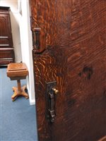 Lot 118 - An oak and mahogany cross banded housekeepers cupboard second quarter 19th century