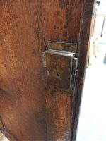 Lot 118 - An oak and mahogany cross banded housekeepers cupboard second quarter 19th century