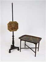 Lot 238 - An early 19th century ebonised and gilt pole screen and tole peinte rectangular tray (2)