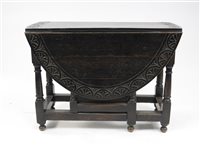 Lot 240 - A Victorian stained oak gateleg table