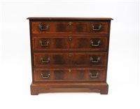 Lot 293 - A mahogany and yewood crossbanded George III style chest of drawers