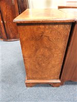 Lot 245 - A reproduction figured walnut bachelor's chest