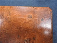 Lot 245 - A reproduction figured walnut bachelor's chest
