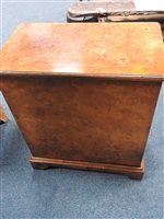 Lot 245 - A reproduction figured walnut bachelor's chest