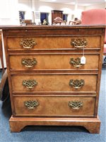 Lot 245 - A reproduction figured walnut bachelor's chest