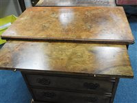 Lot 245 - A reproduction figured walnut bachelor's chest