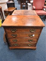 Lot 245 - A reproduction figured walnut bachelor's chest