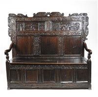 Lot 280 - A joined oak box seat settle, early 18th century and later