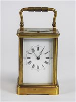 Lot 221 - A brass carriage clock with repeating movement