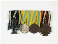 Lot 209 - Four Imperial German medals including Iron Cross and War Cross