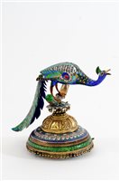 Lot 276 - An Indian parcel gilt and silver enamelled peacock