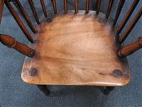 Lot 105 - An ash Windsor chair