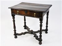 Lot 124 - A part early 18th century oak side table
