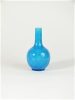 Lot 252 - A Chinese turquoise monochrome porcelain bottle vase, Qing