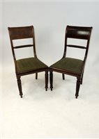 Lot 138 - A set of eleven (10+1) regency mahogany dining chairs