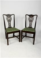 Lot 314 - A set of four George III style mahogany dining chairs