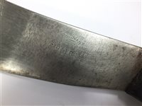 Lot 160 - A WWI bayonet with a machete and two kukri knives