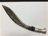 Lot 160 - A WWI bayonet with a machete and two kukri knives