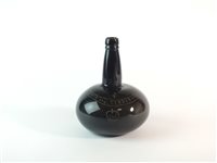 Lot 3 - A 19th century engraved onion wine bottle
