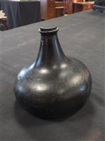 Lot 10 - An 18th century glass onion bottle