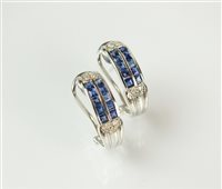 Lot 175 - A pair of sapphire and diamond earrings