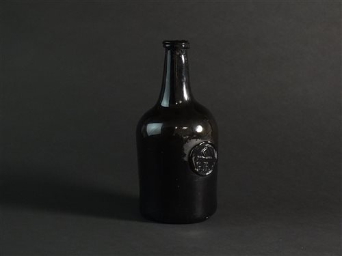 Lot 13 - An 18th century green glass wine bottle with 'G.B' seal