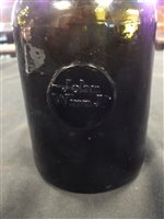 Lot 5 - A glass wine bottle with 'John Winn Jr' seal