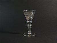 Lot 331 - An engraved and dated wine goblet