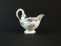Lot 33 - A Worcester porcelain blue and white cream boat
